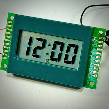 4XC-A0JA, 12-hour LCD alarm clock module